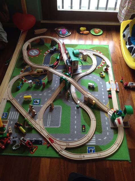 A crane lifts and lowers cargo onto the train and a helicopter soars over the town with blades spinning. Brio train set - Jack was super into this from 2 1/2 - 4 # ...