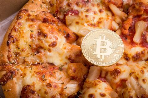 Crypto legend who bought pizza with 10,000 bitcoin is back at it in this photo illustration, a visual representation of digital cryptocurrencies, bitcoin, ripple, ethereum, dash, monero and litecoin is displayed. Will we all be able to buy pizzas with cryptocurrency soon?