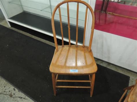 Airy rattan accent slicks up a nouveau take on tradition. BEND CANE CHAIR