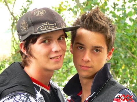 This opens in a new window. Cute teen boy couple outdoor action