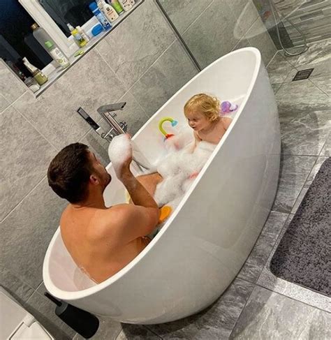 Baby accidentally pooped in the water. Gaz Beadle accidentally flashes privates in bathtime snap ...