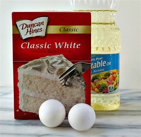 · duncan hines classic white cake mix · 1/2 cup softened butter: Cake Mix Cookies