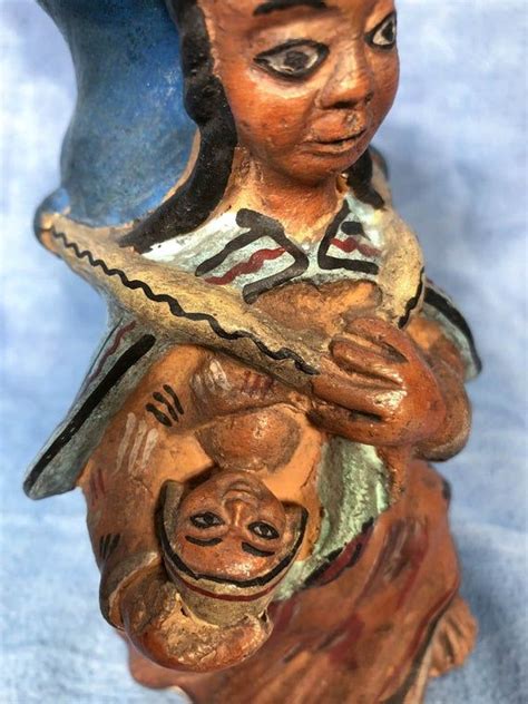 Listen and read to find out. Vintage South American Bolivian Mother Clay Sculpted ...