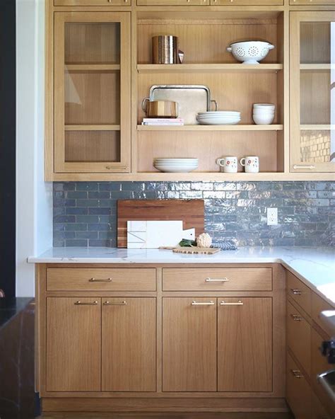 Whether your kitchen is a throwback or brand new, decorating with oak cabinets and white appliances is easier than you think. I have a thing for these rift sawn white oak cabinets. If you don't know me, I'm living in a "f ...