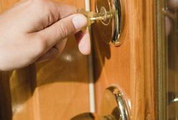 How the door works with a portable lock. How to Install a Deadbolt Lock on a Door Without Cutouts ...