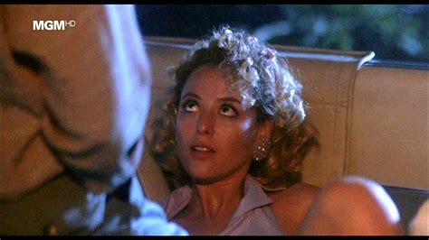 A loner moves in to a small texas town, finds himself a job, and sets about plotting to rob the local bank. Virginia Madsen in The Hot Spot (1990) | Hot spot