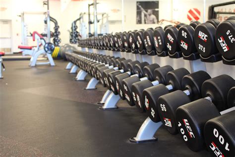 The facility includes an octagon, bag room, weights, and cardio equipment. Fitness & Training Gym in Coquitlam, BC | UFC GYM