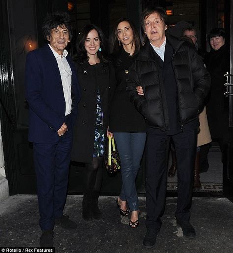 Monty python and the holy grail. Rockers Ronnie Wood and Sir Paul McCartney takes their ...