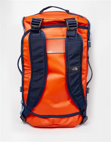 The north face produces outdoor clothing, footwear, and related equipment. The North Face Base Camp Duffle Bag In Small in Orange for ...