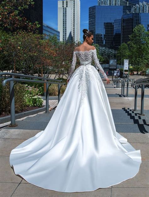 Wedding dresses have come quite a ways too. Crystal Design Couture Wedding Dresses - Paris Collection ...