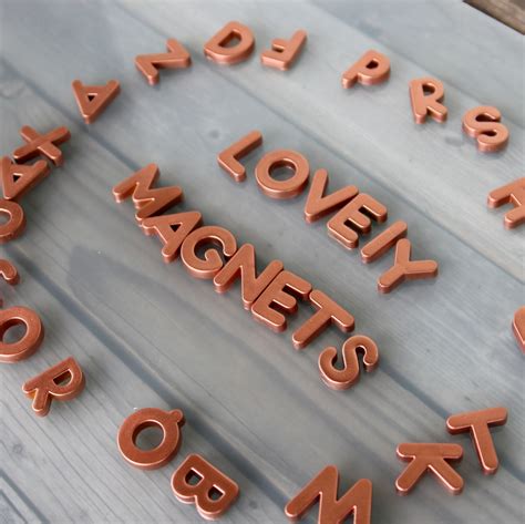 28 consonants and 12 vowels. DIY metallic alphabet magnets