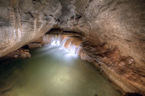 Learn about limestone caves and why the unique small druzy crystals in the walls gives crystal cave it's name. Civil War Natural Cave Missouri