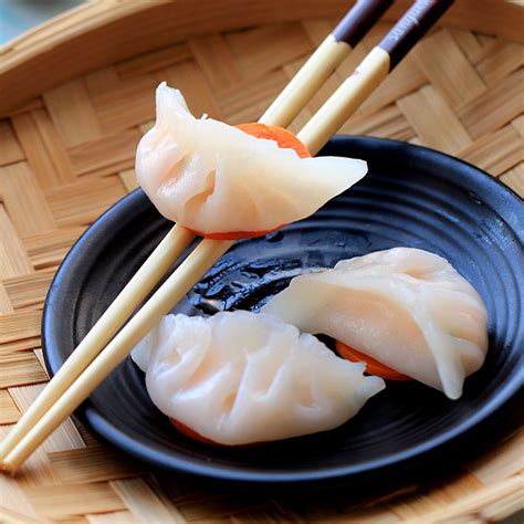 The dim sum dumplings are filled up with various ingredients like fresh vegetables, seafood, rice, or a combination to make them tasty. Dim-Sum Shrimp Dumpling (Har Gow) | China Sichuan Food