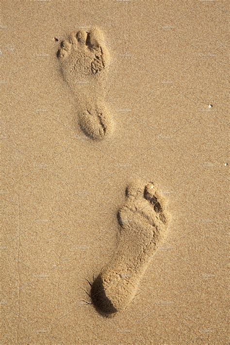 Image of beach sand footprints. Footprints on sand on the beach | High-Quality Nature ...