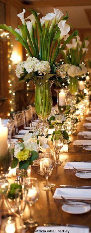 Find large, artificial tropical leaves, like this calla lily leaf. Tall calla Lilly centerpieces for long wedding table ...