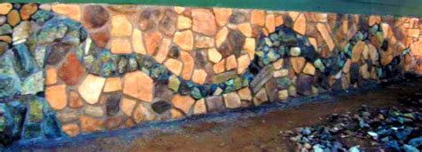 If your building is near a lake or river, try to choose a fascia style that matches the stones near the water for a more authentic look. Eldorado field stone with serpentine rock laid to ...