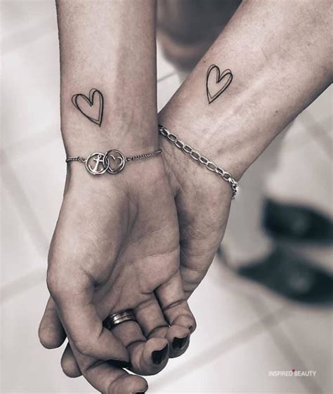 Need some couple tattoo ideas? Matching tattoos for married couples - Inspired Beauty