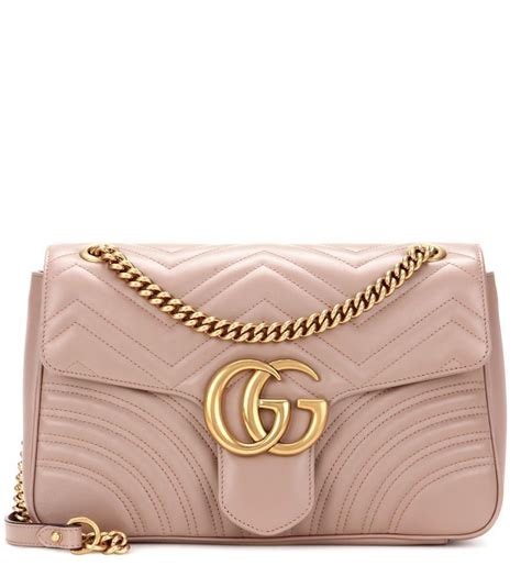 Gucci's love of good leather and fine detailing worked towards creating collections of bags that surpassed every other accessory on the market. Gucci Tasche GG Marmont Medium Beige 2.100,00 ...