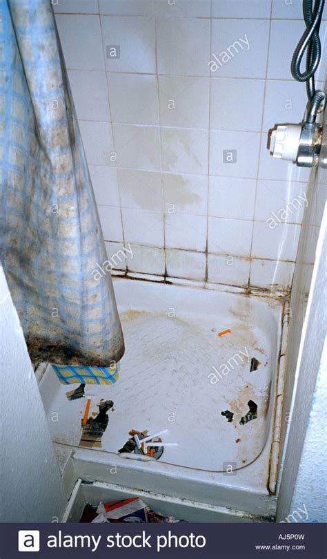 Getting dirty in the shower. Dirty shower with accumulated rubbish Stock Photo ...