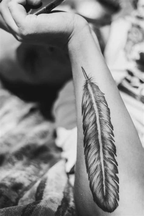 This tattoo can symbolize just that. What does a Feather Tattoo Mean - Self Tattoo