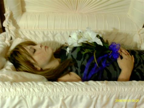 What a waste to buried beautiful creatures in a dark hole and let them rot away. Woman in casket | Flickr - Photo Sharing!