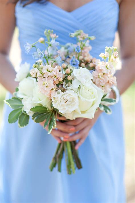 You may use matching brooches or buttons or go for colorful ones in your bouquet, it depends on the look you wanna create and the colors of your wedding scheme. Spring bridesmaid bouquet for a country club wedding ...