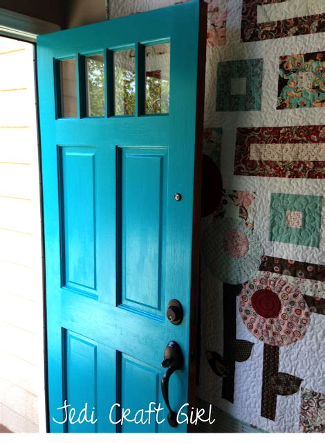 This subtle black door matches the shutter tones creating contrast with this white home. Another turquoise door. I'd add black glaze. Love it ...