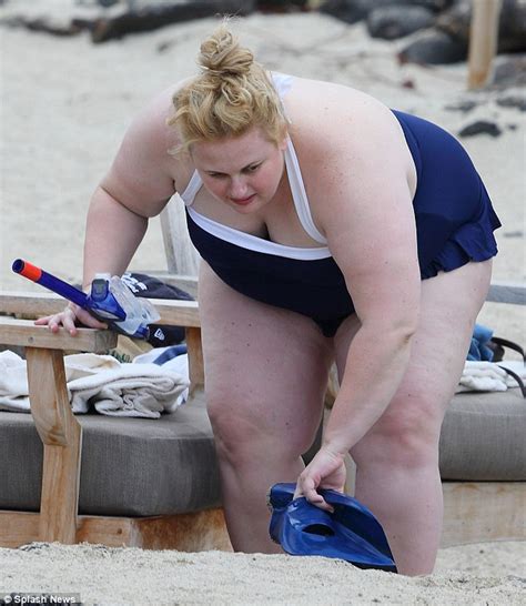 Wilson wore a black swimsuit and a chic white hat, while her boyfriend looked relaxed as he held wilson's hand. Rebel Wilson slips into frilly blue swimsuit in Hawaii ...