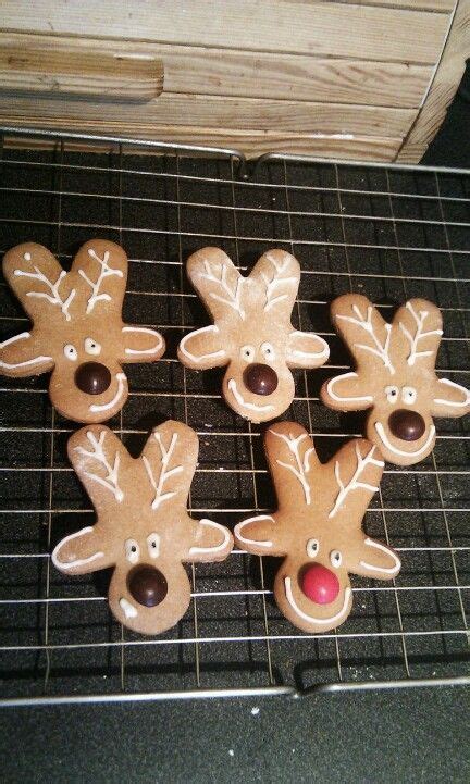 Place gingerbread men upside down (heads facing down) on wax paper or parchment . Upsidedown Gingerbread Man Made Into Reindeers ...