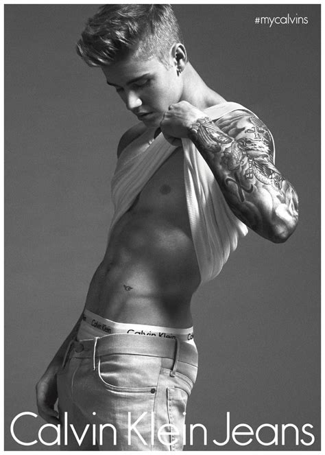 Justin bieber and hailey baldwin join calvin klein's 50 year anniversary campaign and share a steamy kiss for the cameras. Justin Bieber Poses for Calvin Klein Jeans Spring 2015 ...