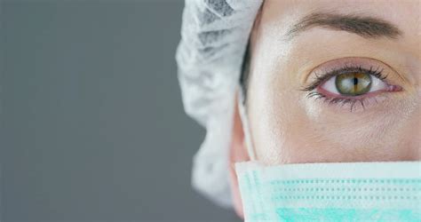 Physicians in our medical clinics practice family medicine, internal medicine, pediatrics and ob/gynecology. close up portrait of a woman surgeon or doctor with mask ...