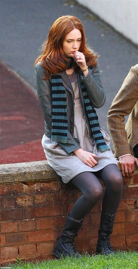 If you overload with camel then the best choice of boots would be tan and then go with a tan colored tight. Karen Gillan in dark grey tights and black boots | Karen ...