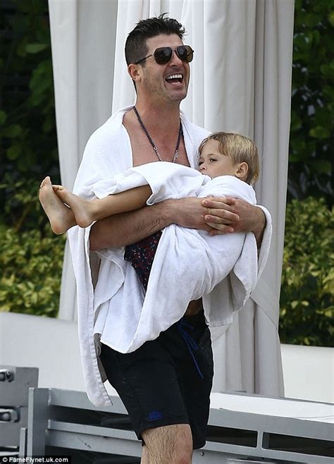 Julian 18 with boyfriend in bathroom. Robin Thicke shirtless as he hangs out with son Julian ...