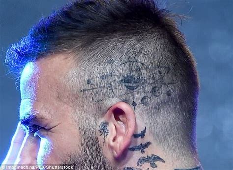 Yeah, i got 10 roses around my arms, the inked. David Beckham unveils solar system and rose tattoo at ...