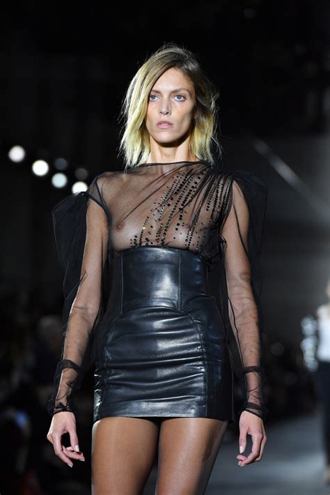 It's a red app with a white, stylized p on it. Anja Rubik Photos - Saint Laurent : Runway - Paris Fashion ...