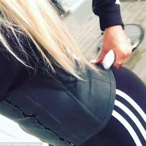 Shoeplay in black nylon catsuit. Khloe Kardashian shares video of niece North West swearing ...