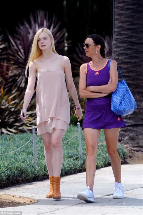 Elle Fanning channels her Maleficent alter ego as enjoys ...