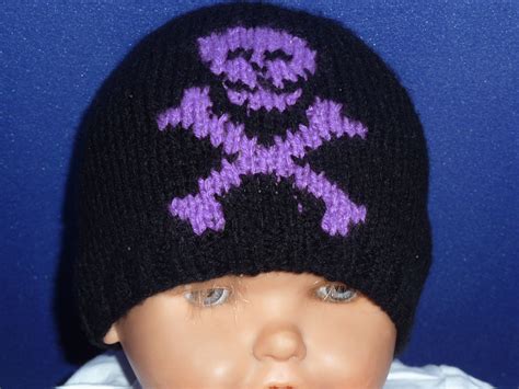 Knitting patterns and essays with robust flavor. Skull and Crossbone Gothic knitted Hat, Baby Goth Hat ...