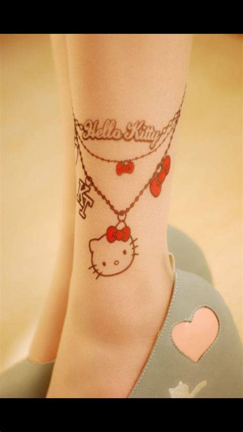 'hello kitty' tattoo on her left arm. If I ever get a tattoo, it will be like this but pink bows ...