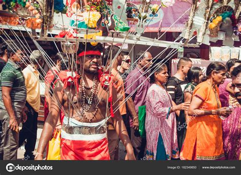 During thaipusam, an annual celebration of the triumph of good over evil, hundreds of thousands of spiritual pilgrims climb the 272 stairs up into the batu caves carrying. BATU CAVES, SELANGOR, MALAYSIA - 31 JANUARY 2018 Hindu ...