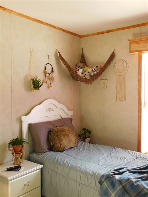 Diy stuffed animal hammock made out of scrap fabric, folded into a triangle with a 90 degree angle, and tacked to the wall with nails. Stuffed Animal Storage, Toy Hammock | Stuffed animal ...