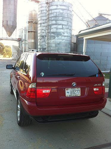 Our test car had the optional sport package. Purchase used 2006 BMW X5 IMOLA RED / BLACK LEATHER / PANORAMIC ROOF / SPORT PACKAGE in ...