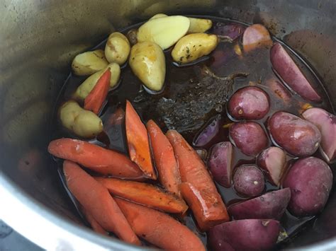 Deglaze with red wine, scraping the bottom of the pot to get all of the delicious bits. IP_TraditionalPotRoast_13
