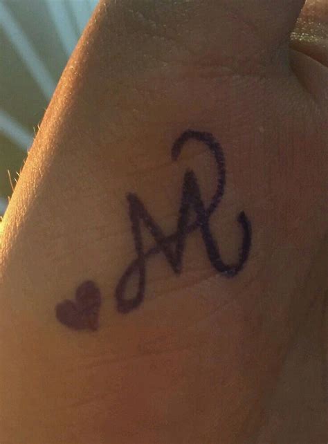 Initial tattoos can express strong emotions and deep love and that is why many couples and lovers get . Pin by Mithursan.Akalvany on mithu | Alphabet tattoo designs, Tattoo ...