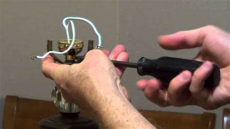 Cut the plug from the lamp cord with wire cutters. How to Install a 3 Way Lamp Socket - YouTube