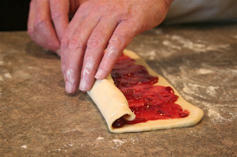 Stuffed braided bread is almost better than pumpkin rolls. Frosted Braided Bread - Braided Cinnamon Raisin Bread ...