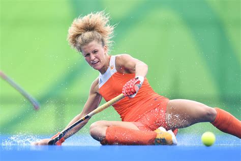 Field hockey, outdoor game played by two opposing teams of 11 players each who use sticks curved at the striking end to hit a small, hard ball into their opponent's goal. TOPSHOT-OLY-2016-RIO-HOCKEY-NED-NZL