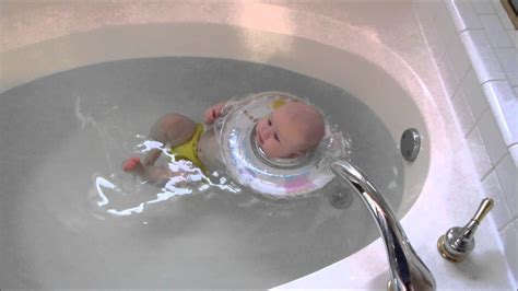 The first bath will be a sponge bath. First time using swimava baby ring - YouTube