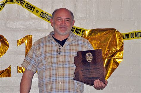 The kids played pin the badge on the officer and we had a finger printing station for fun! Retiring NPD officer surprised with party | Community ...