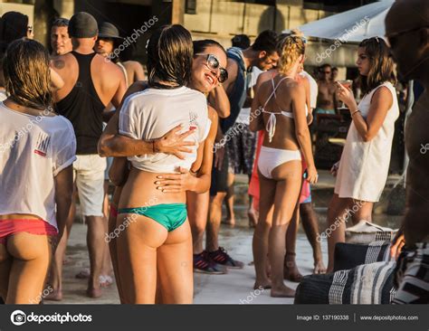 This hotwife swinger gets screwed hard. Sexy girls enjoy beach party. - Stock Editorial Photo ...